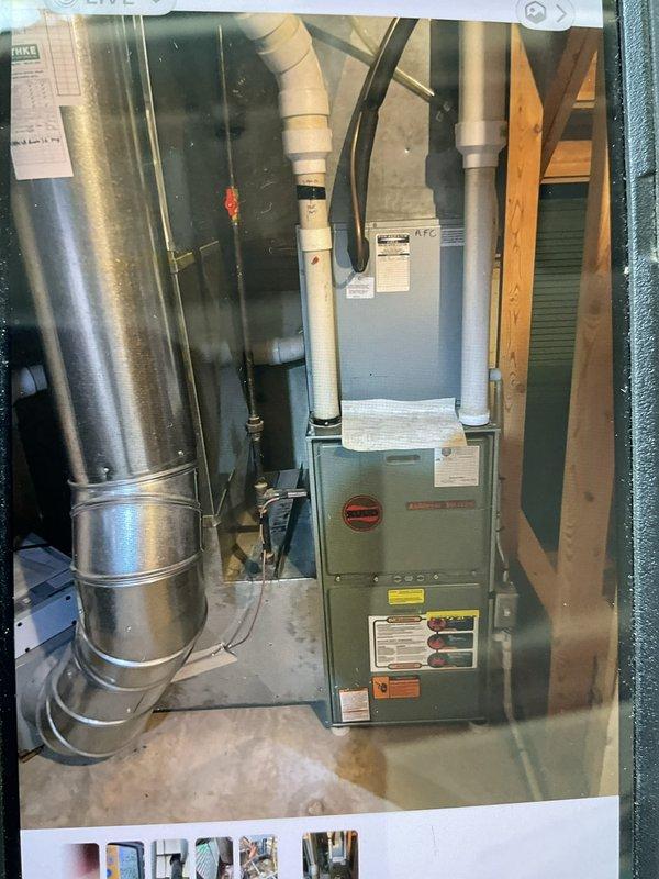 Performed comprehensive air conditioning tune-up and inspection on residential HVAC system. Upon examination, discovered unit is low on R-22 refrigerant and contains significant debris accumulation in base pan. Due to R-22 refrigerant type and low charge condition, recommended complete air conditioner replacement as most cost-effective solution, as unit passed inspection but will require replacement to maintain reliable cooling operation.