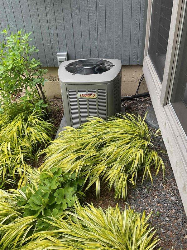 Responded to no cooling complaint on Lennox air conditioning system installed in March 2025. Found tripped circuit breaker with rough feel when reset. Exercised breaker approximately twelve times to improve contact operation. Verified outdoor unit operation with amperage draw at 4.2 amps on one leg, which is within normal operating range, and confirmed system is now cooling properly.