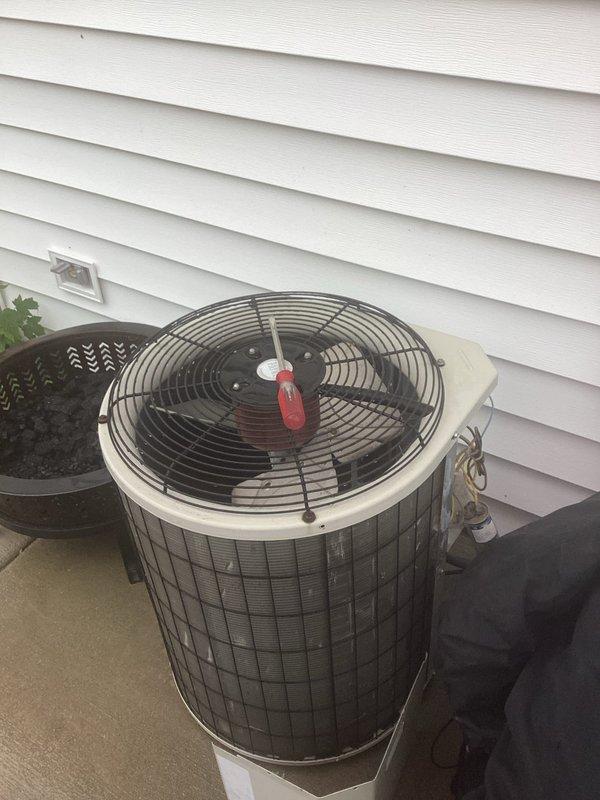 Responded to no cooling call on residential air conditioning system. Diagnosed failed dual capacitor preventing compressor and condenser fan operation. Replaced defective capacitor with proper replacement unit, restoring system to normal cooling operation.