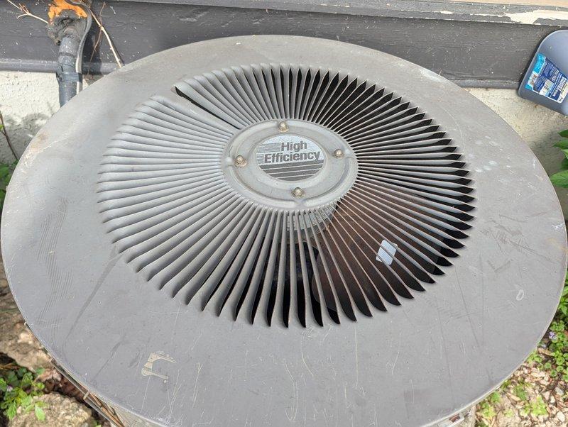 Performed comprehensive AC clean and check on 20-year-old outdoor condenser unit with visible hail damage to protective mesh grille and extensive rust staining. Inspected condenser fins for hail damage and assessed overall system condition. Conducted furnace inspection to evaluate replacement needs. Attempted to tighten loose kitchen faucet but determined mounting hardware is cross-threaded and cannot be secured. Both HVAC systems have reached end of service life and require replacement. Faucet requires new installation due to damaged threading. Customer advised of findings and replacement recommendations for all three items.