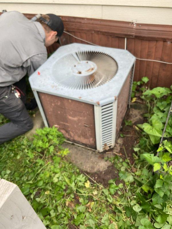 Responded to no cooling complaint on residential air conditioning system. Upon arrival, found unit not operating due to damaged control wire connection. Repaired faulty wire splice to restore power to outdoor condenser unit. After restoring operation, diagnosed system as low on refrigerant charge requiring future service.