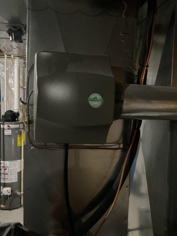 Performed complete clean and check maintenance on 2018 Lennox furnace system that had not received service in its 7-year lifespan. Conducted thorough inspection of all furnace components, performed basic cleaning procedures, and verified proper operation of heating system. Additionally addressed air conditioning unit experiencing no cooling condition with lack of cold air output. Deployed manifold gauge set and refrigerant testing equipment at outdoor condensing unit to diagnose cooling system issue and restore proper AC operation.