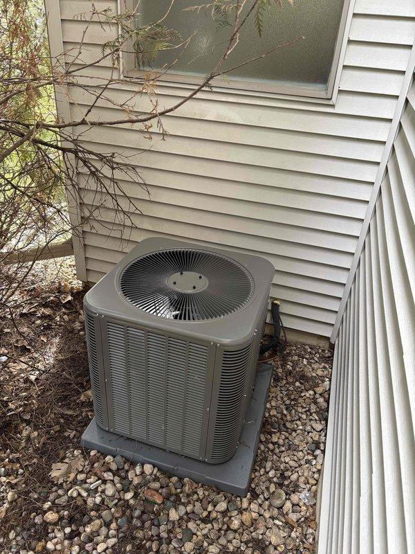 Responded to callback for noise complaint from outdoor condenser unit on recently installed system. Upon arrival, inspected condenser unit and surrounding installation area. Unit was operational and cooling properly at time of inspection. Performed visual examination of condenser housing, fan assembly, mounting hardware, and concrete pad for any loose components or debris that could cause abnormal sounds. Verified unit was level on pad and properly secured. Documented current condition of installation with photos showing condenser positioning, clearances, and overall system setup for service records.