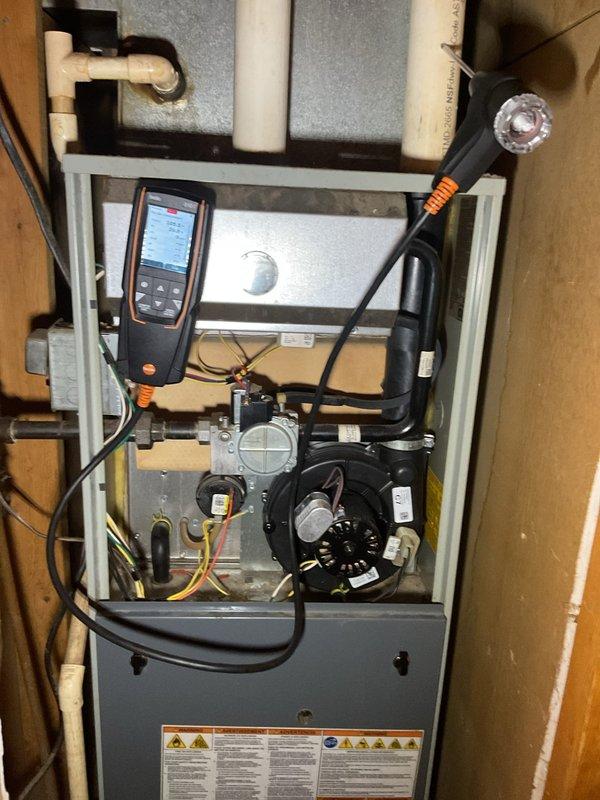 Completed comprehensive furnace clean and check on American Standard Freedom 95 single-stage unit in response to customer report of humming noise. Identified loose 24V transformer as source of noise complaint and secured mounting hardware to eliminate vibration. Performed full system inspection including gas valve assembly, blower motor operation, electrical connections, and safety controls with all components testing within normal parameters.