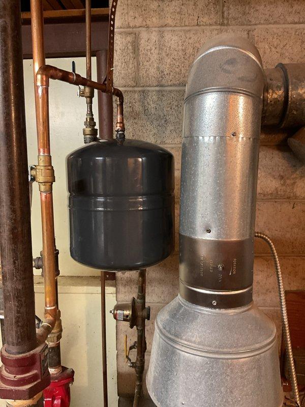 Responded to service call for leaking boiler system components. Upon inspection, identified failed expansion tank with active leak compromising system pressure integrity. Removed defective expansion tank and installed new pressure tank with proper mounting hardware. Replaced three deteriorated ball valves on copper piping connections to ensure proper system isolation and flow control. Tested all connections for leaks, verified proper system pressurization, and confirmed operational functionality of heating system components upon completion.