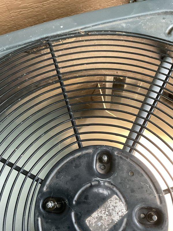 Installed low ambient kit and crankcase heater on air conditioning unit to enable operation in cooler outdoor temperatures and protect compressor during off-cycles. Configured variable speed motor control module settings and verified proper wiring connections to all components. System tested and operational with enhanced cold weather protection capabilities.