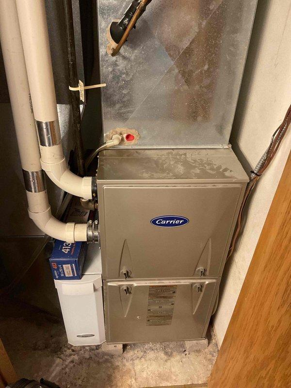 Completed routine furnace cleaning and inspection on Carrier unit. Verified igniter operation within manufacturer specifications, confirmed blower assembly cleanliness, and measured carbon monoxide output at 10 ppm. Temperature rise measured at 43°F and air filter found in good condition, indicating well-maintained system with no immediate service needs identified.