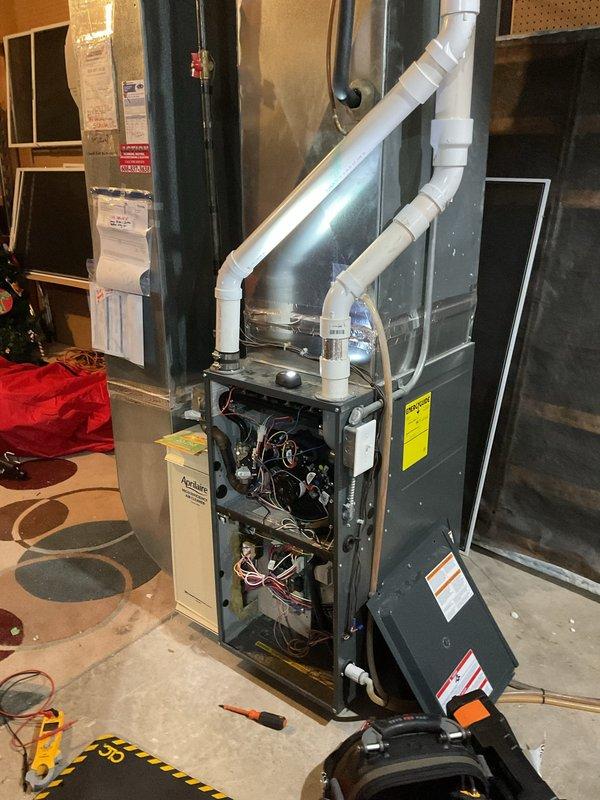Completed comprehensive furnace cleaning and inspection on two-stage heating unit. Performed maintenance including cleaning flame sensor, blowing out pressure switch ports, and removing and cleaning drain trap. Verified igniter resistance at 54 ohms and confirmed safe carbon monoxide levels at 22 ppm (stage one) and 25 ppm (stage two). Inspected electrical connections, confirmed blower fan cleanliness, and noted filter requires replacement by homeowner. Unit tested and operating within normal parameters.