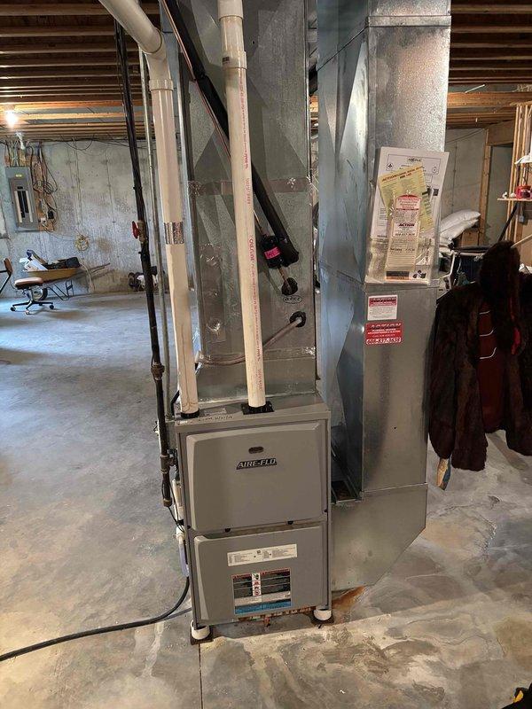 Completed comprehensive furnace clean and check on Airtemp heating system. Performed combustion analysis using Testo 310 analyzer, recording CO levels at 22 ppm and CO2 at 78.5%, confirming unit is operating within safe parameters and manufacturer specifications.