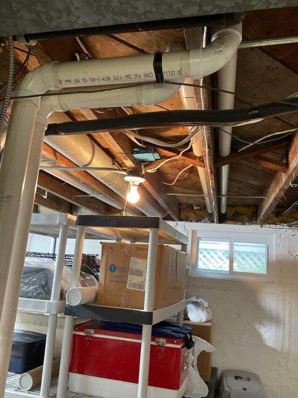 Performed comprehensive furnace cleaning and inspection on a 2003 Lennox unit located in basement utility area. Completed standard maintenance procedures including filter inspection, burner cleaning, and safety system verification on equipment over 20 years old. Unit operational upon completion of service.