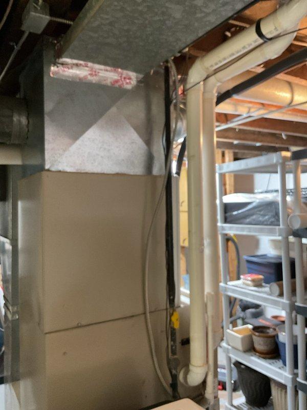Performed comprehensive furnace cleaning and inspection on a 2003 Lennox unit located in basement utility area. Completed standard maintenance procedures including filter inspection, burner cleaning, and safety system verification on equipment over 20 years old. Unit operational upon completion of service.