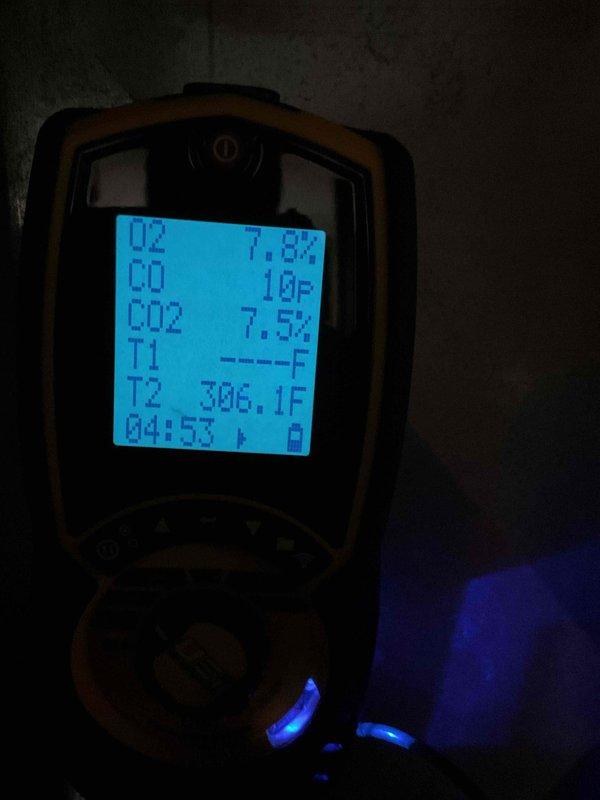 Performed heating maintenance on an older 80% efficiency gas furnace. Conducted comprehensive cleaning and operational check of all components. Utilized combustion analyzer to verify system performance, measuring oxygen levels at 7.8%, carbon dioxide at 7.5%, and flue temperature at 306°F. All readings confirmed proper combustion efficiency and safe operation. Exterior condenser unit inspected; noted vegetation overgrowth around unit requiring clearance for optimal airflow. System operating within normal parameters upon completion of maintenance service.