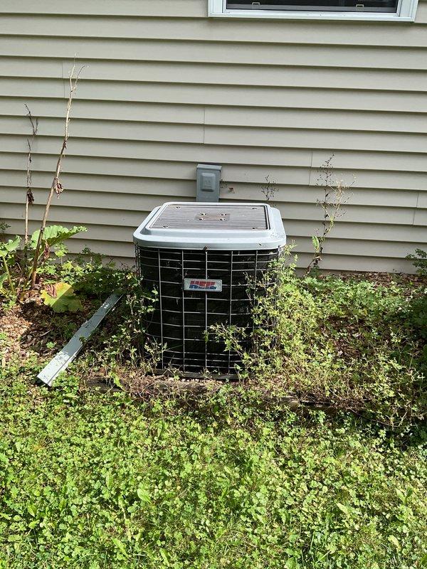 Performed heating maintenance on an older 80% efficiency gas furnace. Conducted comprehensive cleaning and operational check of all components. Utilized combustion analyzer to verify system performance, measuring oxygen levels at 7.8%, carbon dioxide at 7.5%, and flue temperature at 306°F. All readings confirmed proper combustion efficiency and safe operation. Exterior condenser unit inspected; noted vegetation overgrowth around unit requiring clearance for optimal airflow. System operating within normal parameters upon completion of maintenance service.