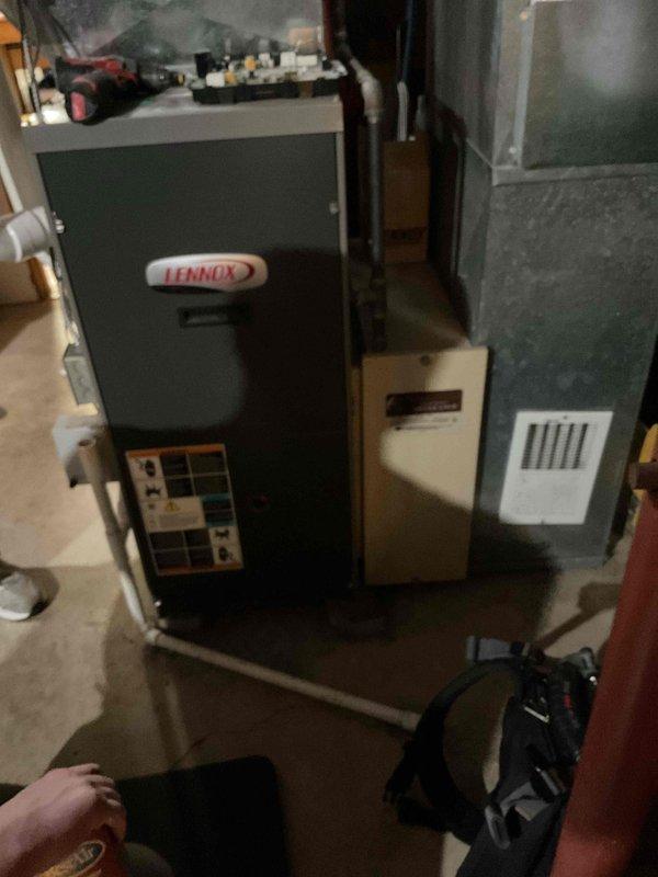 Performed comprehensive furnace tune-up on Lennox unit. Replaced dirty air filter and advised homeowner about box filter option for future maintenance. Conducted system diagnostics including igniter resistance test (34 ohms), verified blower motor operation and cleanliness, measured carbon monoxide output at 11 ppm, cleaned flame sensor, inspected pressure switch ports, tightened all electrical connections, and cleaned drain trap. Unit operating properly with adequate heating performance at time of service completion.