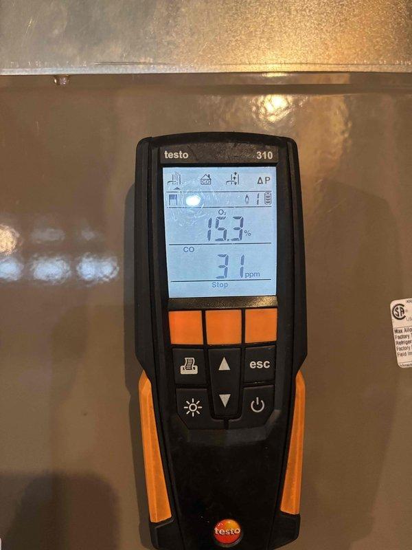 Completed furnace clean and check maintenance service. Performed combustion analysis using Testo 310 analyzer, recording oxygen levels at 15.3% and carbon monoxide at 31 ppm within acceptable parameters. Inspected blower motor assembly, electrical connections, and mounting components; all systems operating properly with no deficiencies noted.