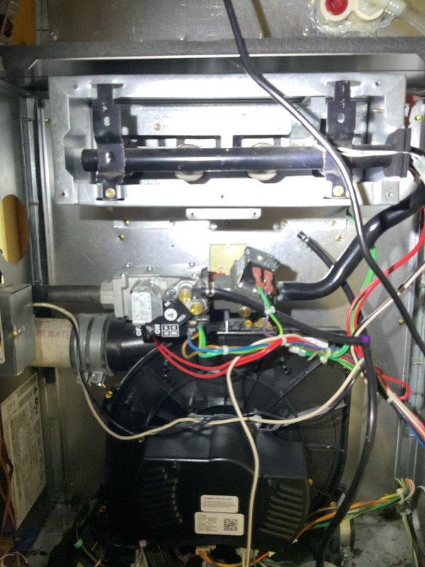 Completed comprehensive tune-up and maintenance on 2008 Carrier furnace unit. Performed thorough cleaning of internal components, removed accumulated debris and organic matter from blower assembly, and conducted complete operational inspection of all electrical connections, control board, and motor components to ensure safe and efficient system performance.