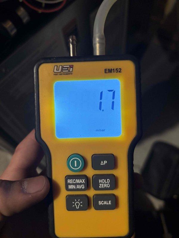 Completed comprehensive furnace tune-up and cleaning on residential heating system. Performed standard maintenance procedures including inspection of all major components, verified gas pressure readings at 1.7 mbar using digital manometer, and confirmed proper operation of venting system with PVC intake/exhaust configuration. All equipment found to be functioning within manufacturer specifications with no issues identified.