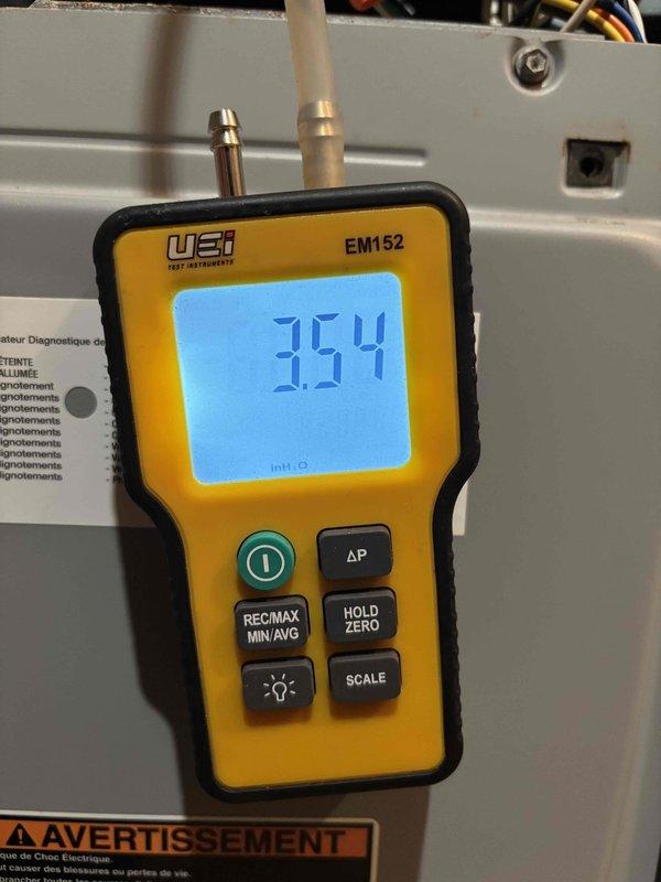 Completed furnace clean and check service. Performed combustion analysis measuring flue gas temperature at 74°F with 0 ppm carbon monoxide, confirming safe and efficient operation. Verified static pressure at 0.354 inches of water column, indicating proper airflow through the system.