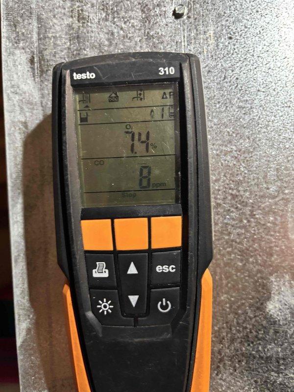 Completed furnace clean and check service. Performed combustion analysis measuring flue gas temperature at 74°F with 0 ppm carbon monoxide, confirming safe and efficient operation. Verified static pressure at 0.354 inches of water column, indicating proper airflow through the system.