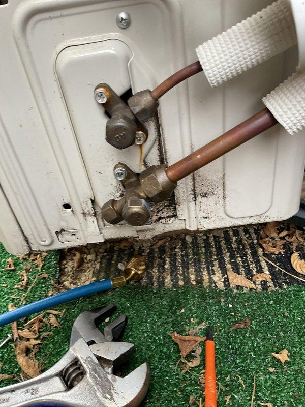 Responded to service call for mini split system that stopped cooling during summer and required heat functionality for upcoming winter. Upon inspection, discovered significant refrigerant leak at suction side service valve on outdoor unit. Used refrigerant detector to identify leak sources at all three ports of suction side valve. Attempted repairs by tightening connections and applying leak sealant to affected areas. Successfully stopped leaks on liquid side valve connections after tightening. 

Performed system test run which revealed system freeze-up on liquid line within five minutes of operation. Measured suction pressure at 75 PSI, indicating substantial refrigerant loss. Despite multiple repair attempts, unable to stop leaks from all three openings on suction side valve, with refrigerant escaping from areas beyond the flare connections. Valve body appears to have multiple leak points that cannot be sealed through standard repair methods.

Based on severity of valve failure, mult