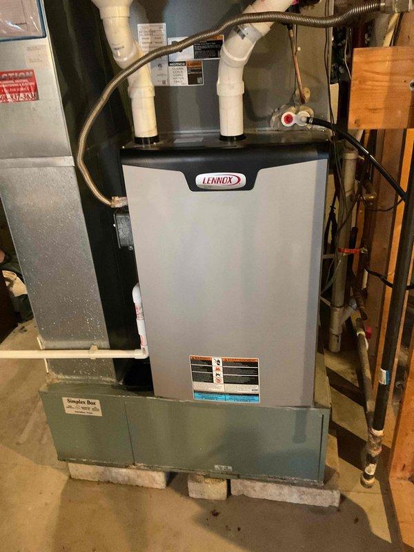Completed comprehensive furnace tune-up on residential Lennox heating system. Performed full system inspection and verified all components operating within factory specifications. Cleaned and serviced humidifier unit, installing new customer-provided humidifier pad to ensure optimal humidity control for the heating season.