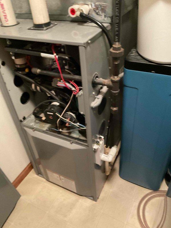Completed annual heating maintenance on 24-year-old Heil furnace unit. Performed thorough cleaning of all accessible components, inspected burner assembly, heat exchanger, blower motor, and electrical connections. Unit operating properly with no deficiencies noted; all systems functioning within normal parameters.
