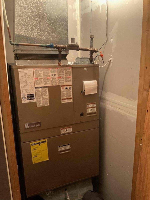 Completed comprehensive tune-up on Weil-McLain Magic Pak combination heating and cooling unit. Cleaned dirty flame sensors to ensure proper ignition and safe operation, replaced air filter, and performed full system inspection. Verified both furnace and air conditioning components were operating within manufacturer specifications upon completion.