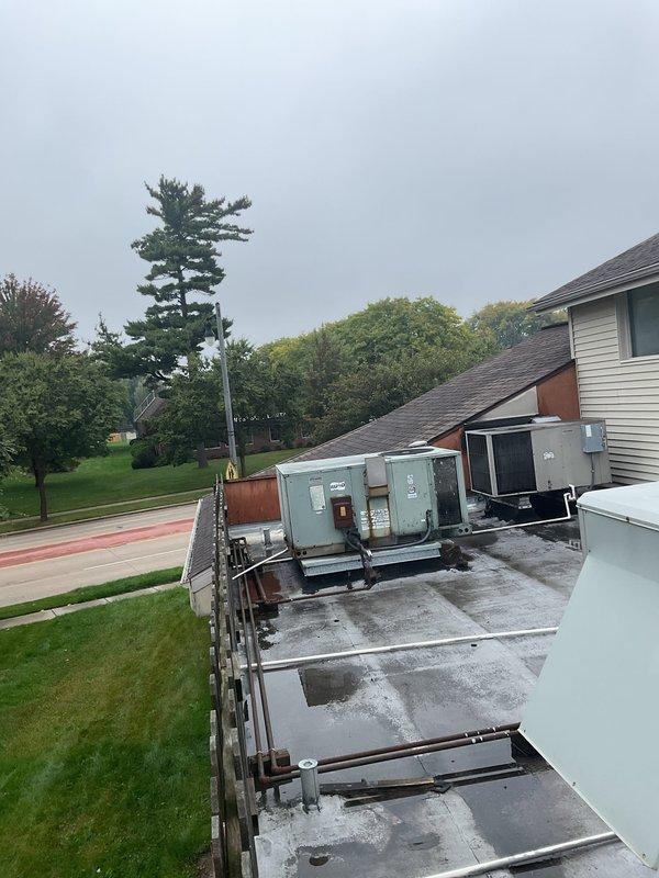 Responded to service call for non-operational air conditioning system at commercial facility. Upon arrival, inspected rooftop HVAC equipment including multiple RTU condensers and air handling units. Diagnosed system malfunction, performed necessary repairs to restore cooling operation, and verified all equipment returned to normal working condition.
