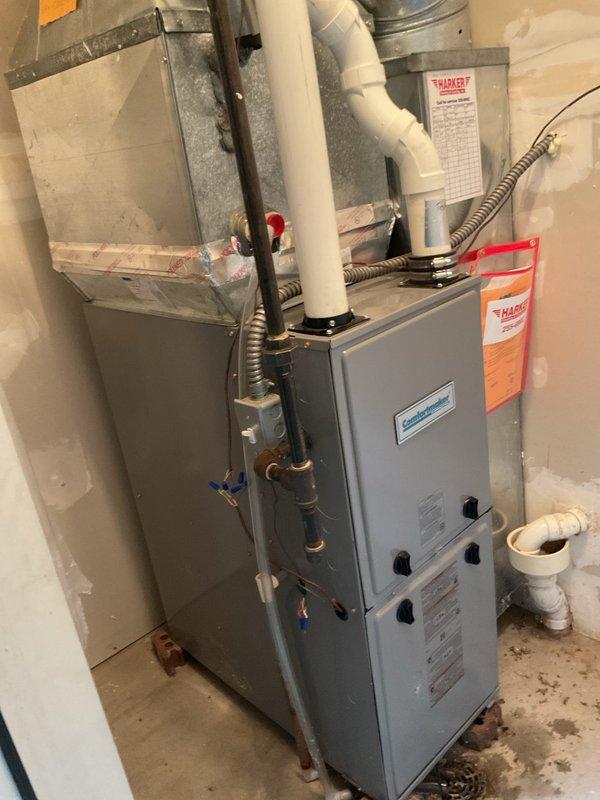 Completed comprehensive furnace cleaning and inspection as part of prepaid maintenance visit. Cleaned flame sensor and condensate trap, verified thermostat wiring connections were secure, installed fresh air filter, and confirmed all components operating within factory specifications. Combustion analysis measured CO at 12 ppm and temperature rise at 48°, both within acceptable parameters for safe and efficient operation.