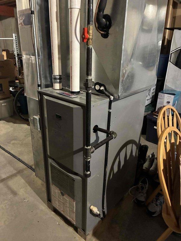Responded to service call for furnace inspection. Upon arrival, detected natural gas leak at 90° fitting inside furnace cabinet. Performed thorough safety inspection of gas supply system and other furnace components. Shut off gas supply, removed defective 90° gas fitting, and installed new fitting with proper thread sealant. Pressure tested gas connections to verify leak-free operation. MGE notified and marked location. System returned to safe operational status.