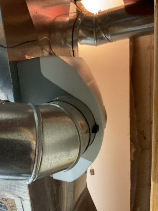 Completed comprehensive tune-up on residential furnace and fireplace system. Addressed excessive soot buildup in fireplace using vacuum extraction methods and cleaned contaminated flame sensor to restore proper operation. Noted plumbing issue with gurgling in upstairs bathroom tub during toilet flushing, which may require plumber evaluation if issue persists beyond HVAC scope.