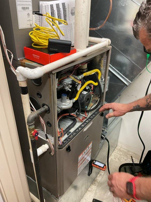 Performed comprehensive cleaning and inspection on four furnace units at the property. Removed access panels and conducted thorough examination of internal components including gas valve assemblies, electrical connections, refrigerant lines, and blower assemblies. Utilized digital diagnostic testing equipment to verify system performance parameters and operational efficiency. Cleaned burner assemblies, checked all electrical connections for proper voltage and amperage, inspected heat exchangers for integrity, and verified proper airflow through each unit. All four furnaces tested within manufacturer specifications and returned to normal operation.