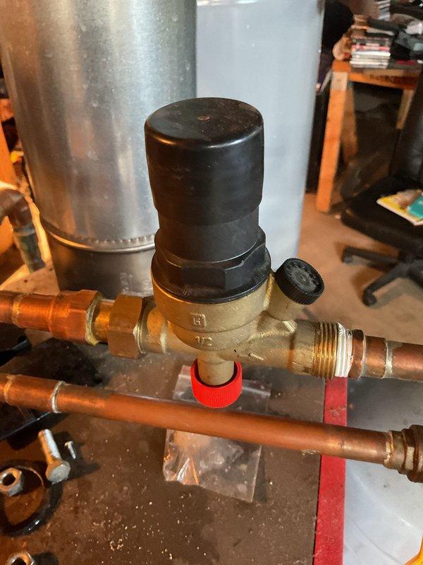 Responded to service call for boiler gurgling noise. Upon inspection, identified dirty backflow preventer as the source of the issue. Disassembled the backflow preventer, thoroughly cleaned all components, and reassembled the unit. Verified proper operation and confirmed gurgling noise was eliminated.
