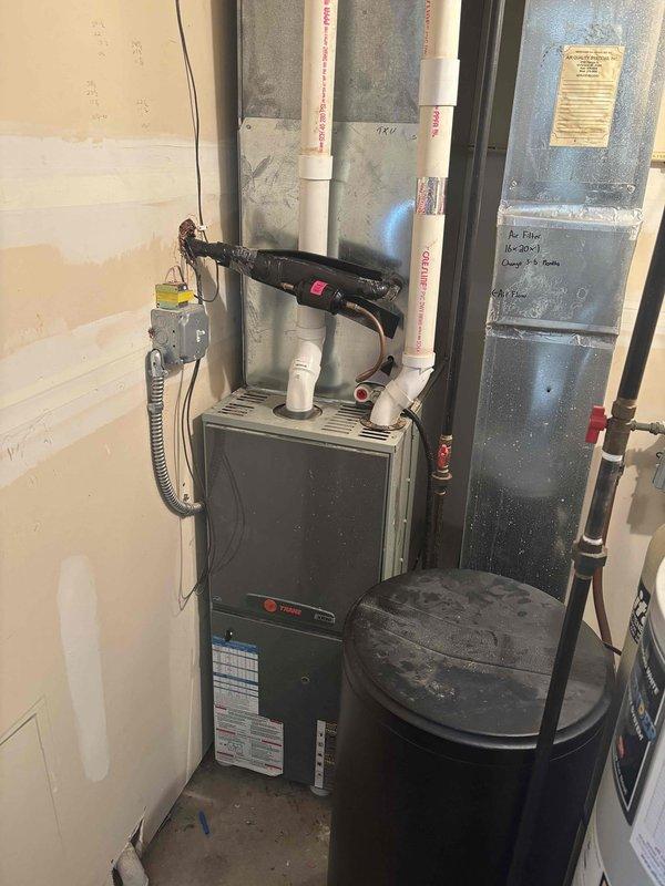 Responded to service call for blower motor failure affecting both furnace and air conditioning operation. Performed diagnostic inspection of Trane furnace system and electrical components. Completed clean and check service, verified blower motor functionality, tested all system controls, and confirmed proper operation of heating and cooling cycles upon completion.
