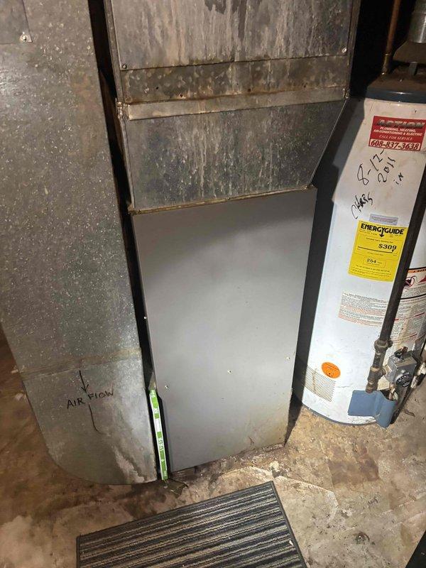 Responded to no-heat call where furnace was clicking but failing to ignite. Upon arrival, observed significant deterioration and corrosion on furnace cabinet panels indicating moisture exposure and age-related wear. Diagnosed ignition system failure preventing burner operation. Completed necessary repairs to restore heating function and verified proper system operation before departure. Customer advised to monitor unit performance.