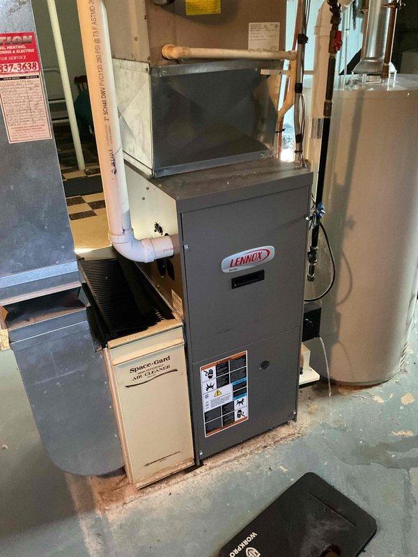 Performed comprehensive furnace tune-up on Lennox single-stage heating system, including installation of new Spaceguard 220 filter (20x25x5). Verified igniter resistance at 33 ohms and confirmed safe combustion with CO reading of 7 ppm. Cleaned flame sensor, cleared drain trap, inspected and tightened all electrical connections at control board, and blew out pressure sensor ports at inducer and header box. Unit tested and confirmed operating with proper heating output.