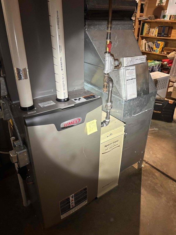 Completed comprehensive furnace tune-up on residential Lennac unit, including full system inspection, filter check, and operational testing. Supply air temperature measured at 125.1°F with return air at 63.3°F, indicating proper temperature rise and system performance within manufacturer specifications.
