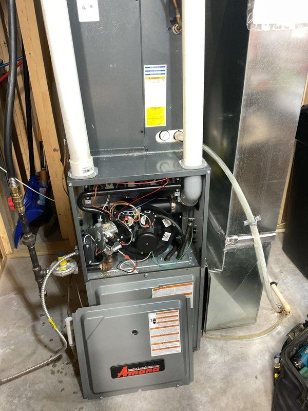 Completed prepaid furnace maintenance on Amana unit. Performed thorough cleaning and inspection of all accessible components including blower assembly, heat exchanger, burners, and control board. Verified proper operation of gas valve, ignition system, and safety controls. Confirmed adequate venting through PVC exhaust and intake pipes. All systems tested and operating within manufacturer specifications.