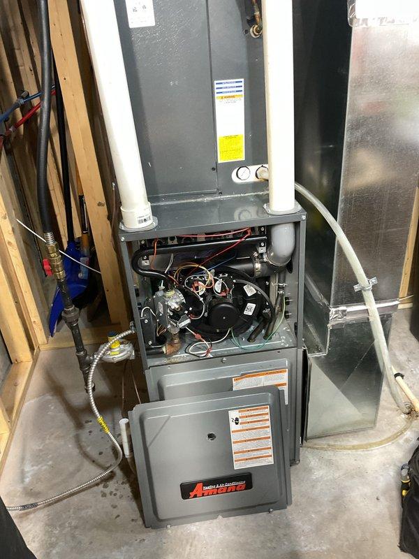 Completed prepaid furnace maintenance on Amana unit. Performed thorough cleaning and inspection of all accessible components including blower assembly, heat exchanger, burners, and control board. Verified proper operation of gas valve, ignition system, and safety controls. Confirmed adequate venting through PVC exhaust and intake pipes. All systems tested and operating within manufacturer specifications.
