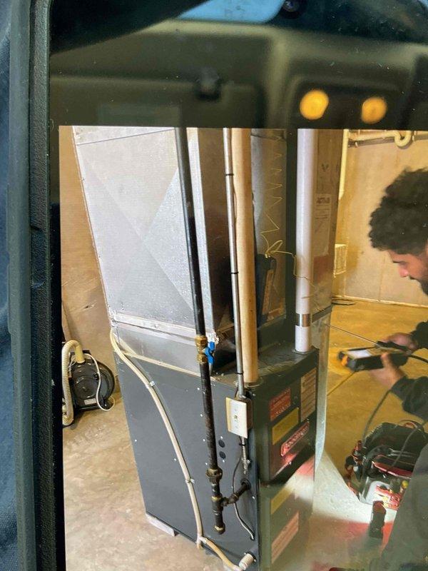 Completed prepaid membership maintenance visit for furnace system. Performed comprehensive clean and check procedure on Coleman furnace unit, verified all components operating to factory specifications, inspected ductwork connections, and confirmed proper venting through white PVC piping system.