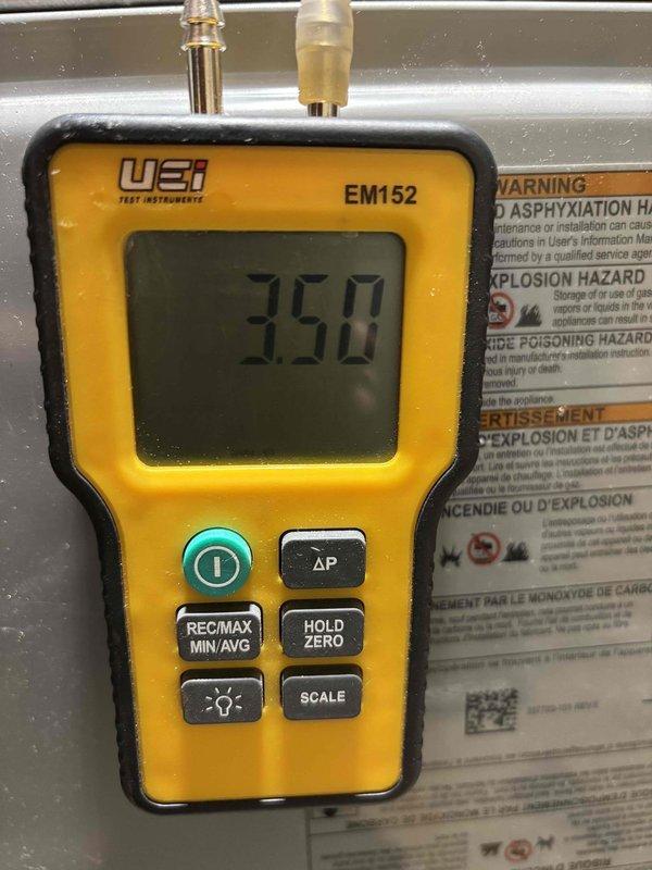 Performed comprehensive furnace clean and check maintenance service on residential heating system. Conducted standard operational testing using digital manometer to verify proper system pressures, reading 350 on diagnostic instrument. Inspected all components including heat exchanger, blower assembly, gas valve, and burner operation to ensure safe and efficient performance for the heating season.