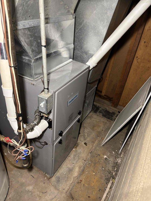 Performed comprehensive furnace clean and check maintenance service on residential heating system. Conducted standard operational testing using digital manometer to verify proper system pressures, reading 350 on diagnostic instrument. Inspected all components including heat exchanger, blower assembly, gas valve, and burner operation to ensure safe and efficient performance for the heating season.
