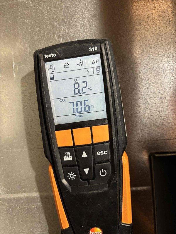 Completed prepaid furnace clean and check maintenance service. Performed combustion analysis using Testo 310 analyzer, recording oxygen levels at 8.7% and carbon dioxide at 10.6%, indicating proper combustion efficiency. Measured supply and return air temperatures at 63.4°F and 53°F respectively, confirming appropriate temperature rise across the heat exchanger.