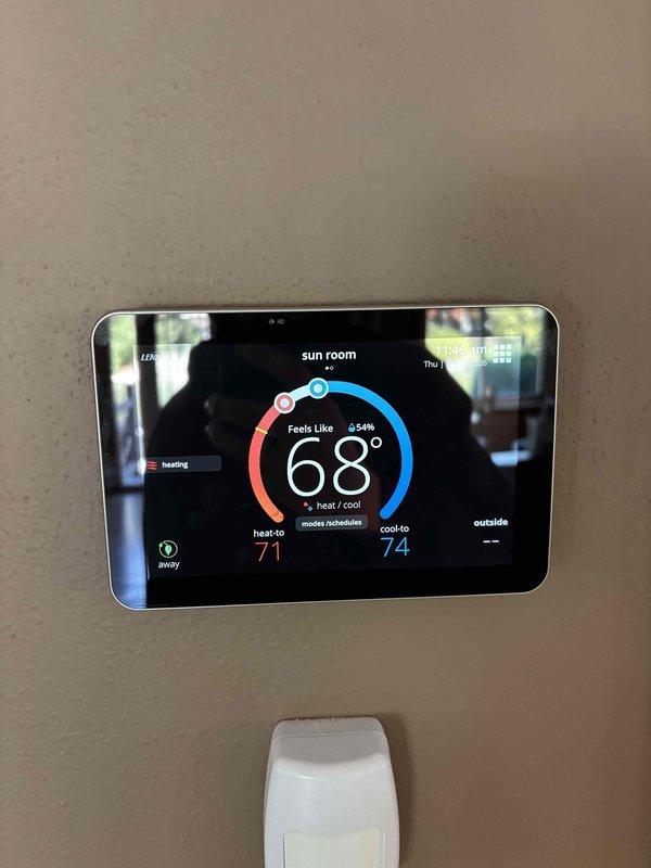 Responded to service call for thermostat issue. Inspected Lennox digital thermostat system controlling multiple zones including sun room and family room. Verified thermostat display functionality, temperature readings, and heating mode operation on both units. System found operating properly with accurate temperature control and zone management functioning as designed.