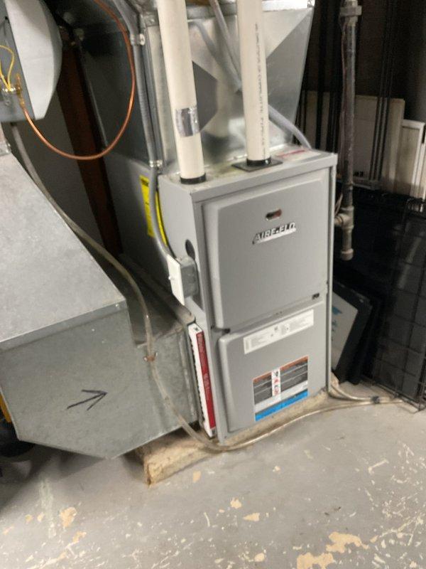 Performed annual heating maintenance on 11-year-old Airtemp furnace unit (Model 92AF1UH070P19B-55) under 10-year parts warranty. Completed comprehensive clean and check procedures, verifying all components operating within factory specifications. Identified dirty air filter requiring replacement; customer confirmed they would replace filter themselves.