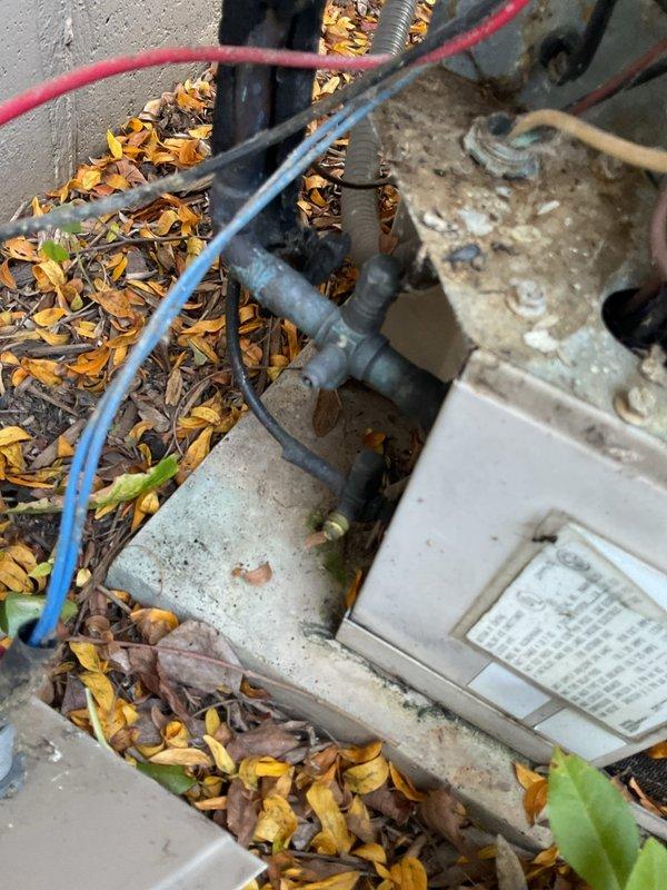 Responded to no cooling call on aging residential air conditioning system. Upon arrival, confirmed condenser unit was non-operational with fan motor completely failed. Diagnosed faulty condenser fan motor preventing unit from running. Observed significant dirt accumulation on condenser coils and general wear consistent with system age exceeding 10 years. Discussed system replacement options with homeowner due to age of equipment and cost-effectiveness of investing in major repairs versus new installation.