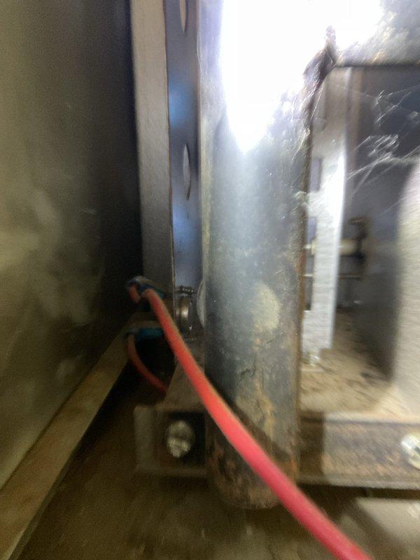 Responded to no-heat call for 2001 suspended furnace in shop area. Unit was short-cycling immediately after ignition due to faulty limit switch that would not reset. Diagnosed failed high-limit safety control preventing normal operation. Replaced defective limit switch and verified proper system operation with normal heating cycles restored.