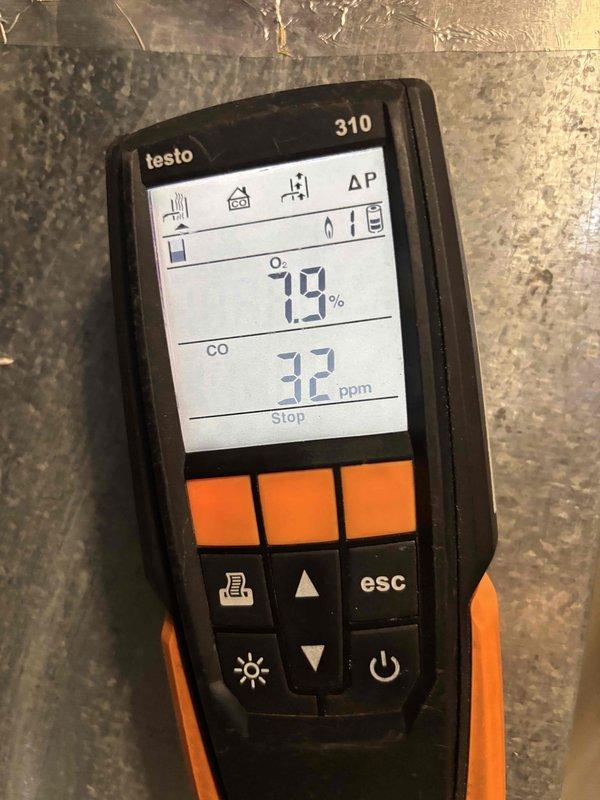 Completed heating maintenance and inspection on furnace system. Performed comprehensive clean and check procedures, measuring combustion efficiency with Testo 310 analyzer showing oxygen levels at 7.9% and carbon monoxide at 32 ppm, indicating proper combustion. Verified system pressure differential readings at 35.1 using UEi EM152 digital manometer. Inspected external piping as requested and confirmed all connections secure with no visible issues.
