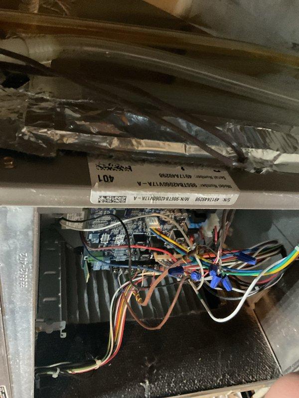 Performed comprehensive heating maintenance and cleaning on 2014 Bryant furnace system. Conducted thorough inspection of all major components including control board, wiring harnesses, blower assembly, and heat exchanger. Verified proper electrical connections across multiple control circuits with orange, blue, white, brown, and yellow thermostat wiring. Inspected ductwork connections and refrigerant lines for integrity. Cleaned accessible components and confirmed system operational readiness. All major components found to be functioning within normal parameters with no immediate repairs required.
