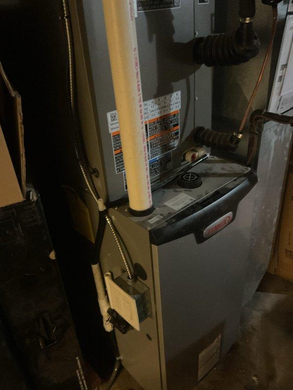 Responded to service call for A/C leaking issue on recently installed system. Upon inspection, discovered condensate drain line obstruction preventing proper drainage. Cleared plugged drain line, verified proper water flow, and tested system operation to ensure leak was resolved and unit was functioning correctly.